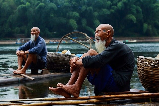 Chinese old man on boat